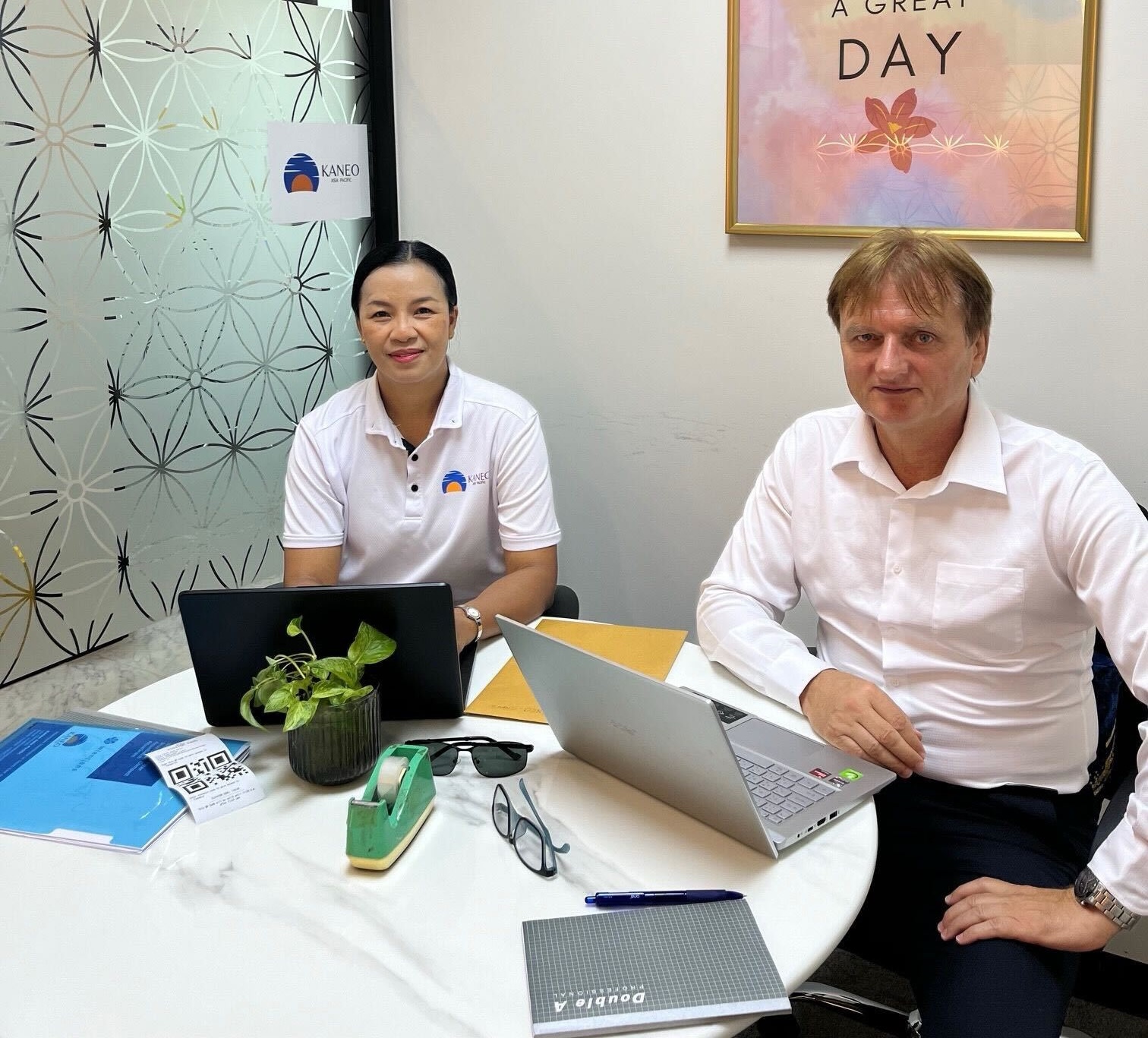 Lou Dimovski of Kaneo Asia Pacific conducting a water and energy efficiency consultation at a commercial laundry facility in Thailand - demonstrating hands-on expertise in sustainable laundry solutions